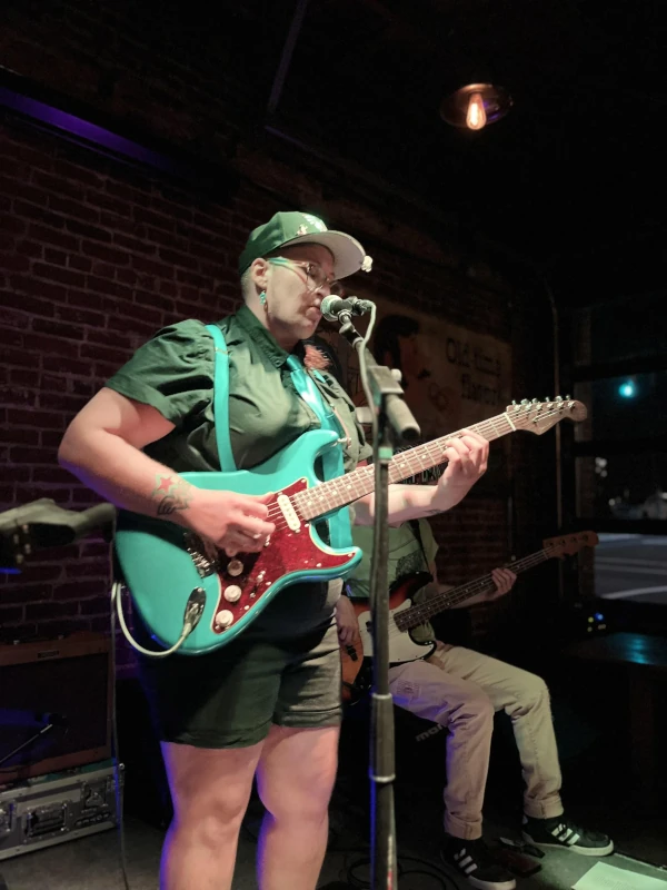 Band and lead guitar playing on stage of Speakeasy in Carrboro